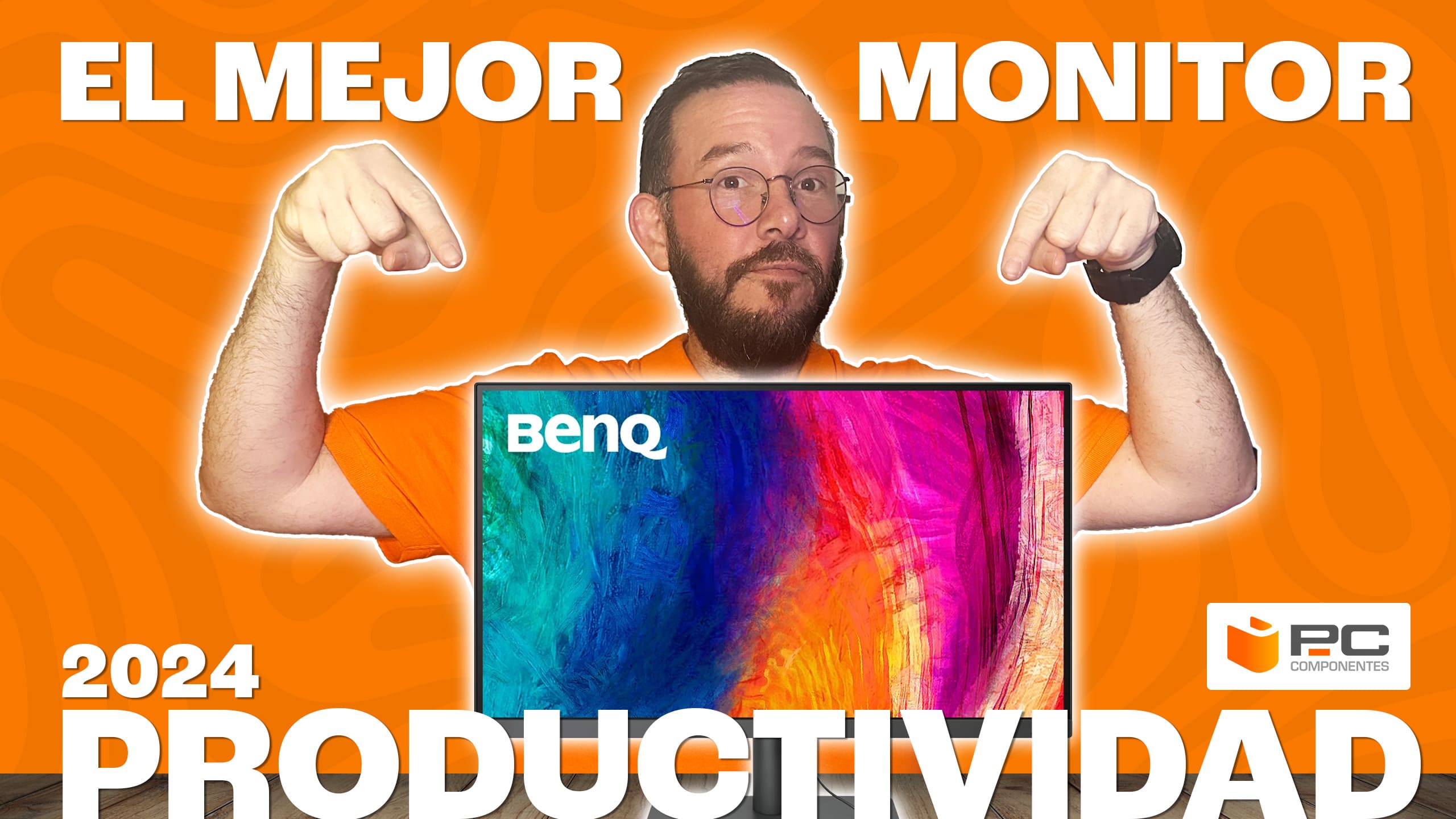 Un experto en informática señala un monitor de la marca BenQ